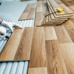 man installing the engineered hardwood floor