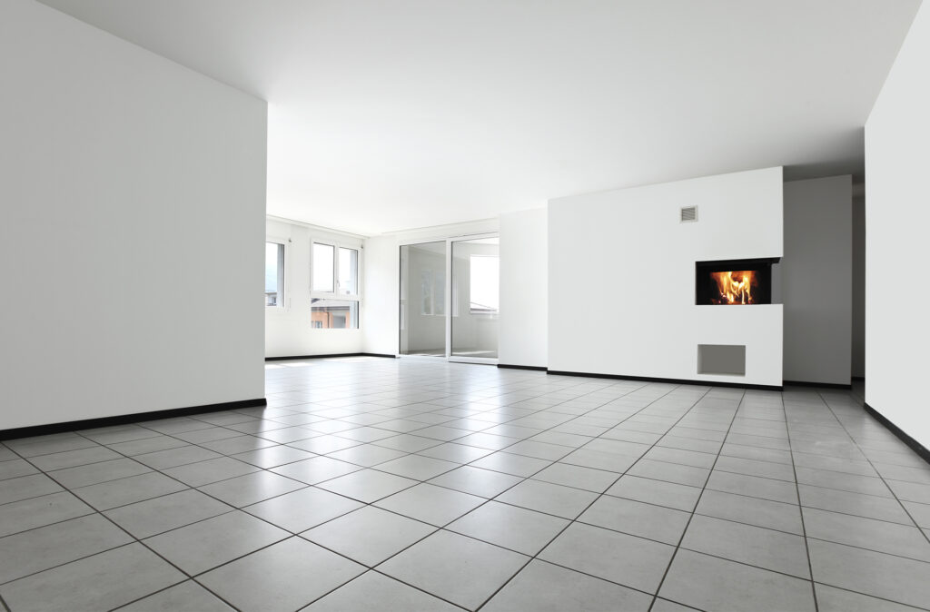 new apartment, empty room with white tiled floor
