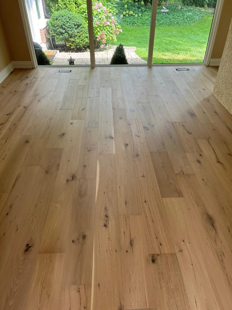 Hickory hardwood flooring in Toronto home — warm colour variation