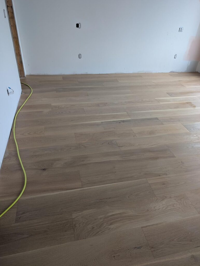 Hardwood floor installation in Toronto basement — LV Flooring