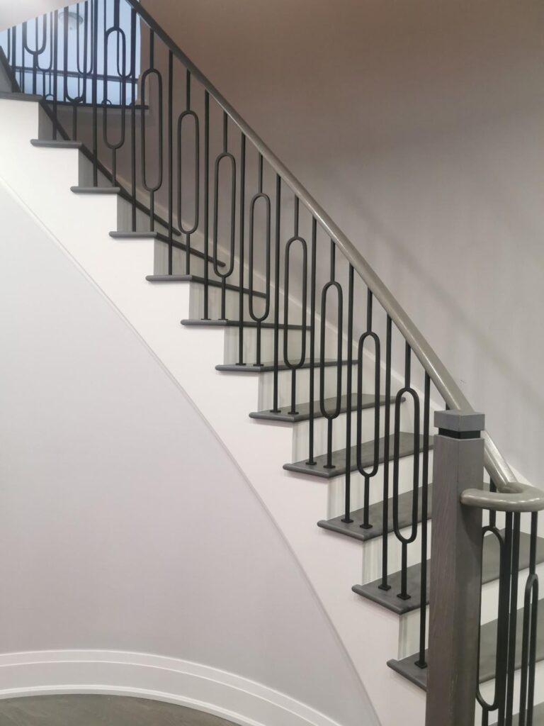 Refinished hardwood staircase with metal balusters — Toronto GTA project by LV Hardwood Flooring